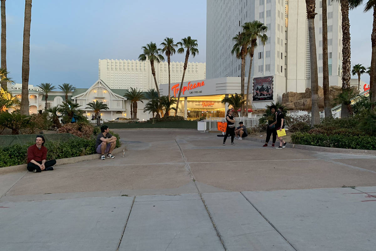 A small group has gathered outside the Tropicana to march on the Las Vegas Strip on Thursday, J ...