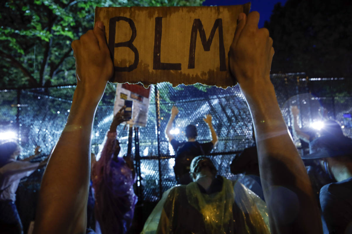 Demonstrators protest Thursday, June 4, 2020, near the White House in Washington, over the deat ...