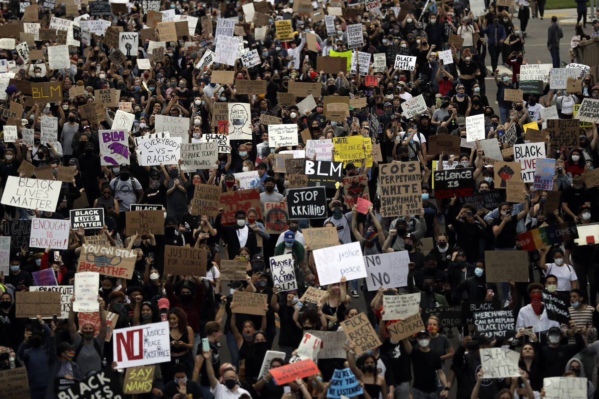 Protesters march Thursday, June 4, 2020, in San Diego. Protests continue to be held in U.S. cit ...