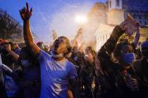 Demonstrators protest, Thursday, June 4, 2020, near the White House in Washington, over the dea ...