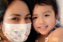 Karen Sombra cuddles with son Sebastian Rodriguez on Thursday, June 4, 2020. (Karen Somba)