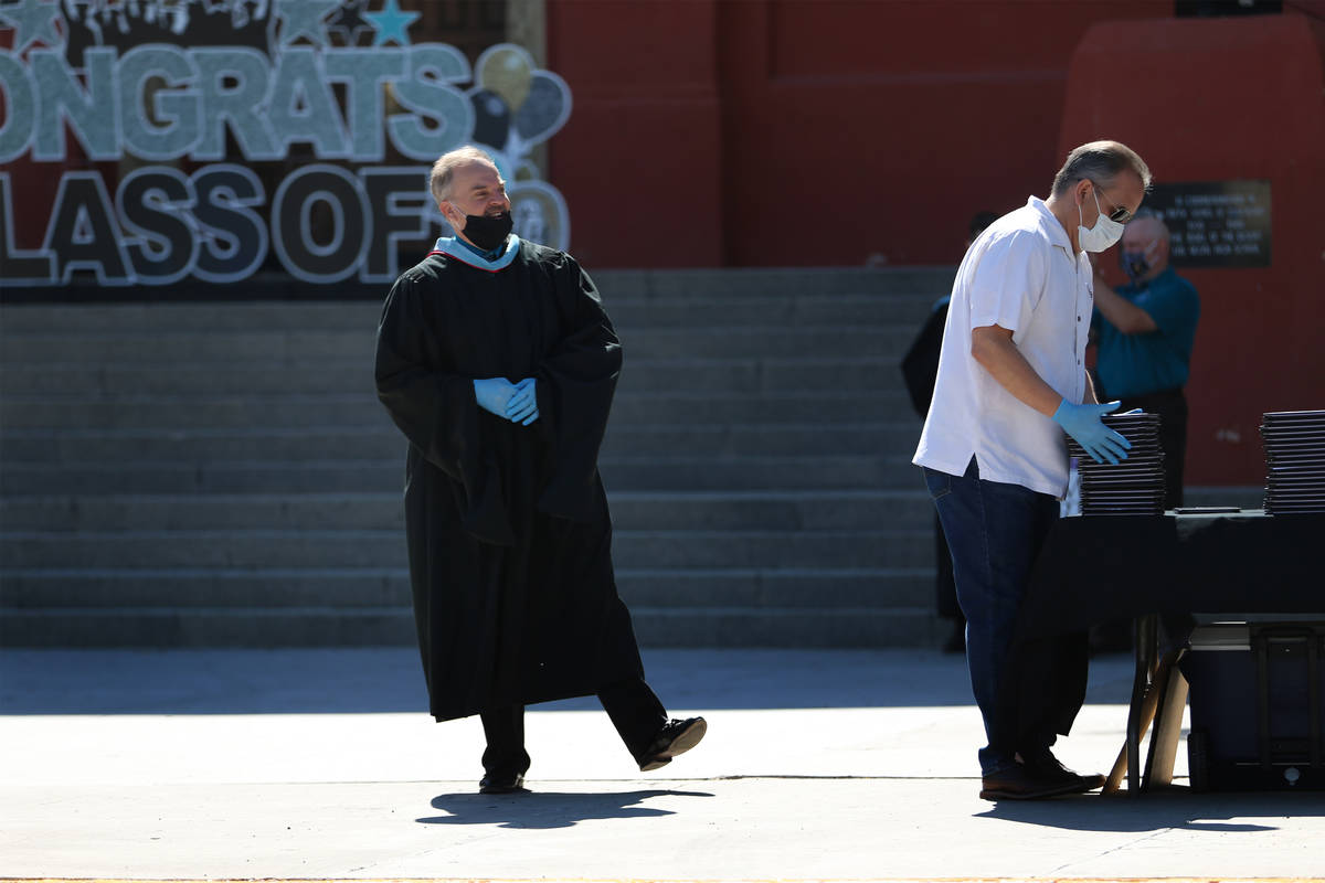 Principal Scott Walker, left, and CCSD Superintendent Jesus Jara, participate during the Las Ve ...