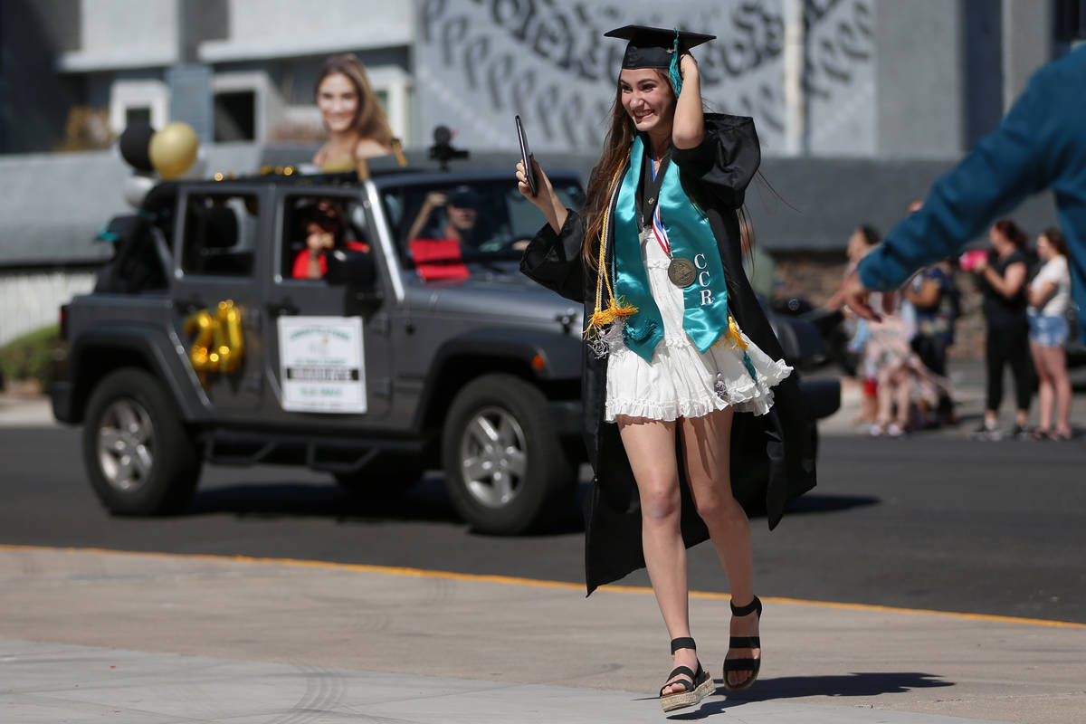 Senior Ellie Grace Kay, 17, graduates during a Las Vegas Academy drive-through graduation in La ...