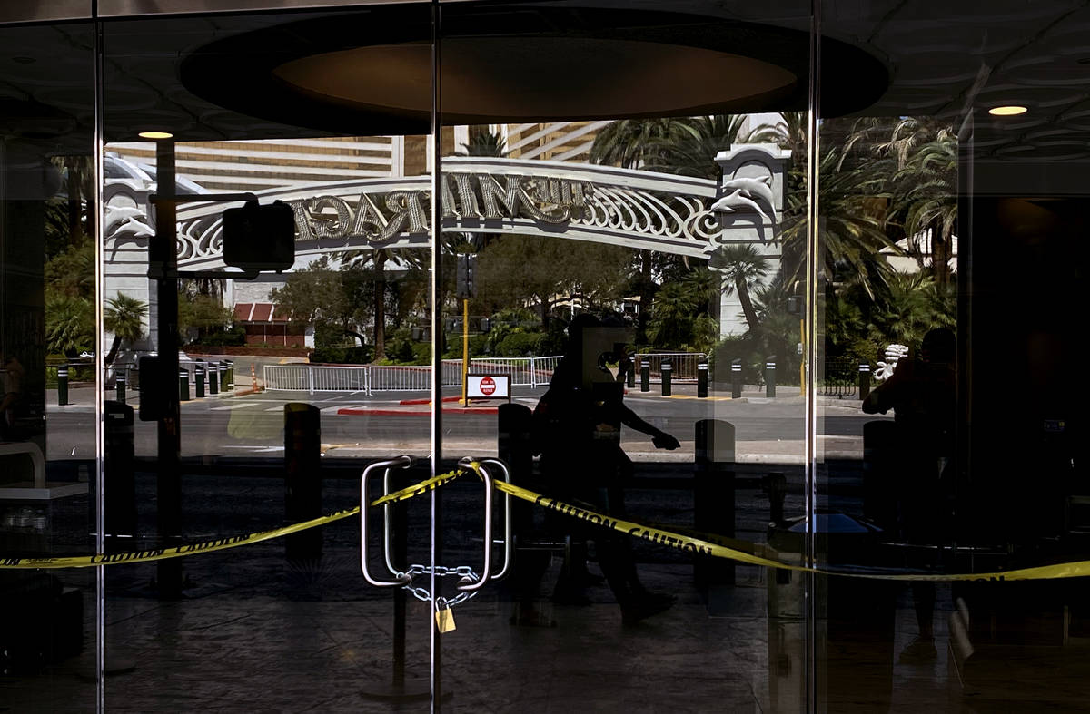 The doors are still locked and chained at Harrah's minutes before they open for business again ...