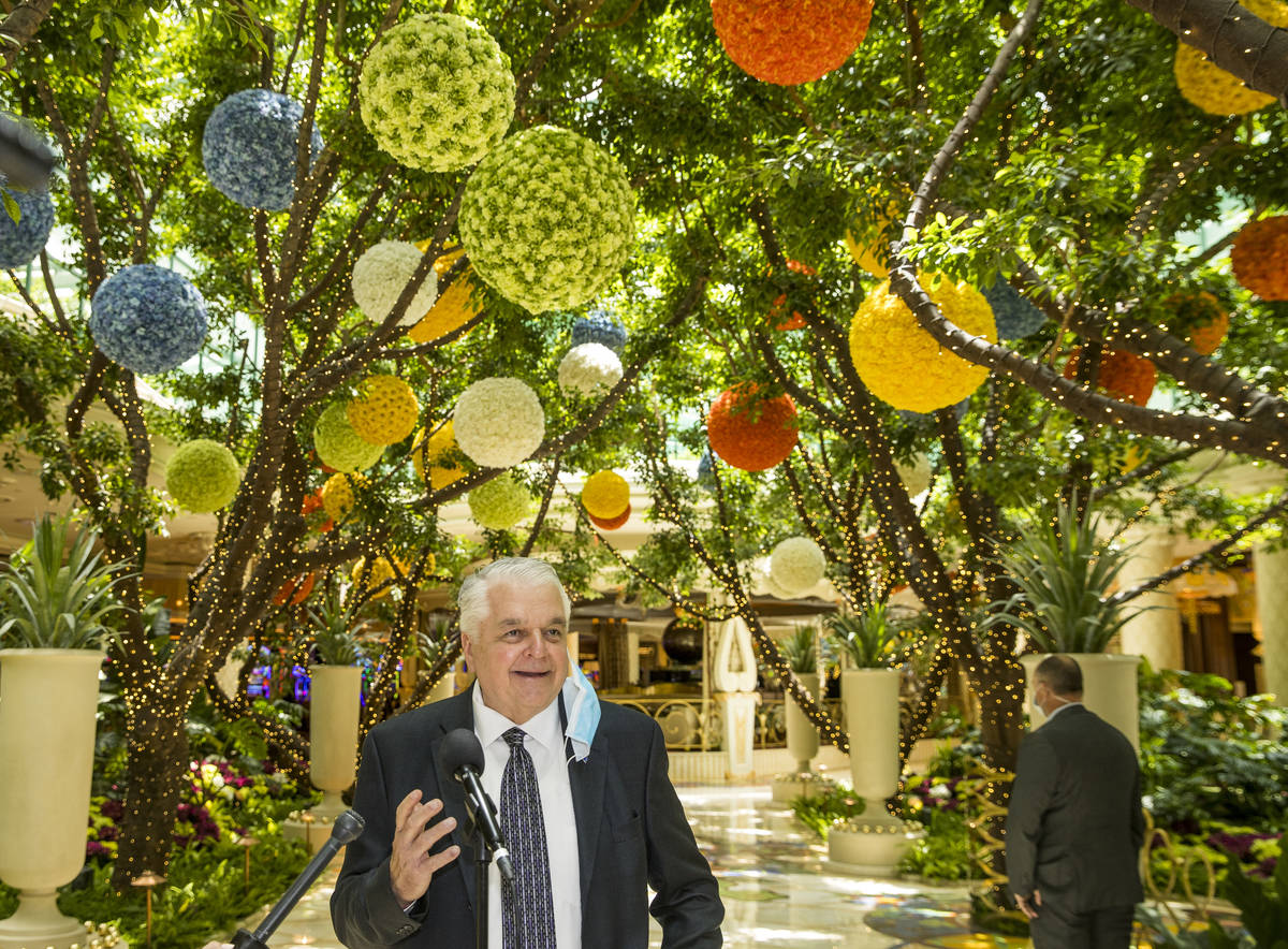 Gov. Steve Sisolak answers a few questions during a tour at the Wynn Las Vegas to view their co ...