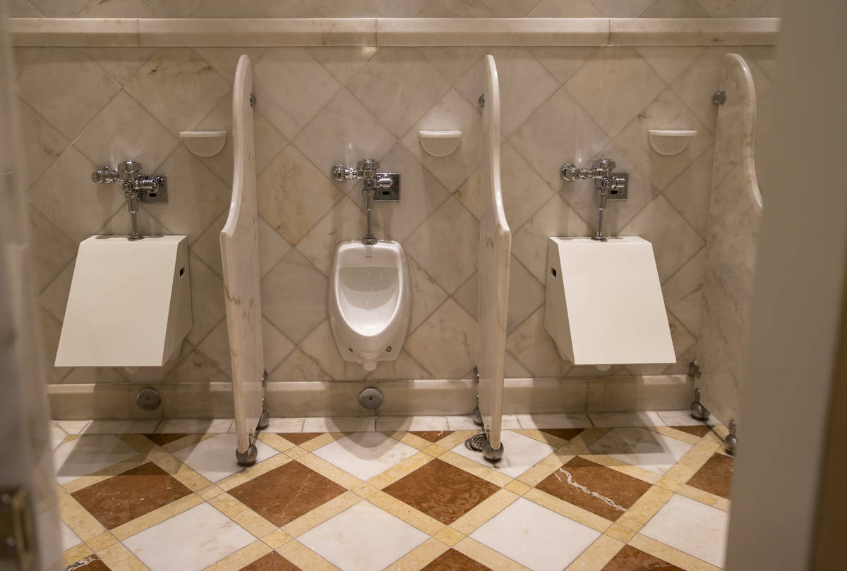 The men's room urinals are social distanced inside the Wynn Las Vegas as Gov. Steve Sisolak is ...