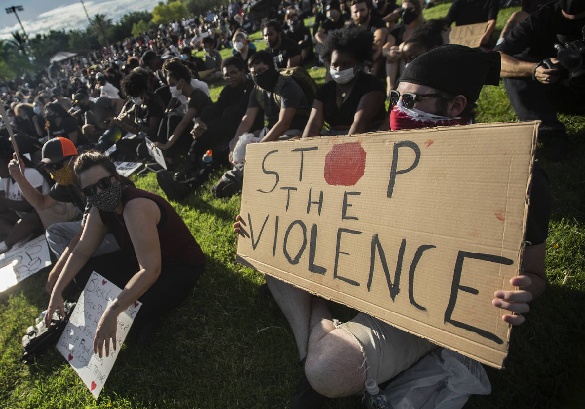 Thousands of people showed up at a Black Lives Matter event at Kianga Isoke Palacio Park on Fri ...
