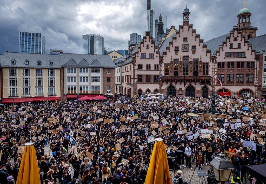 Hundreds of people attend a rally in Frankfurt, Germany, Saturday, June 6, 2020, over the death ...