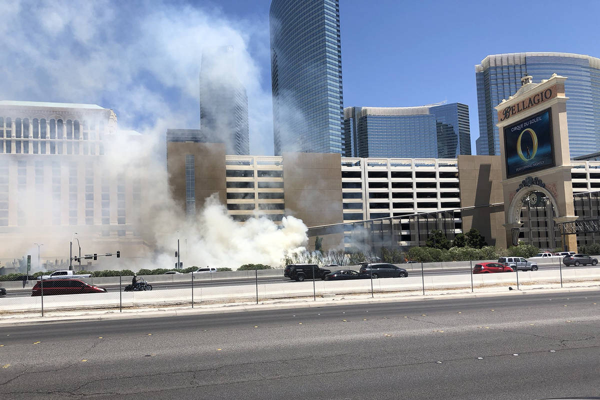 A fire is seen Saturday, June 6, 2020 outside the Bellagio in Las Vegas. (Katelyn Newberg/Las V ...