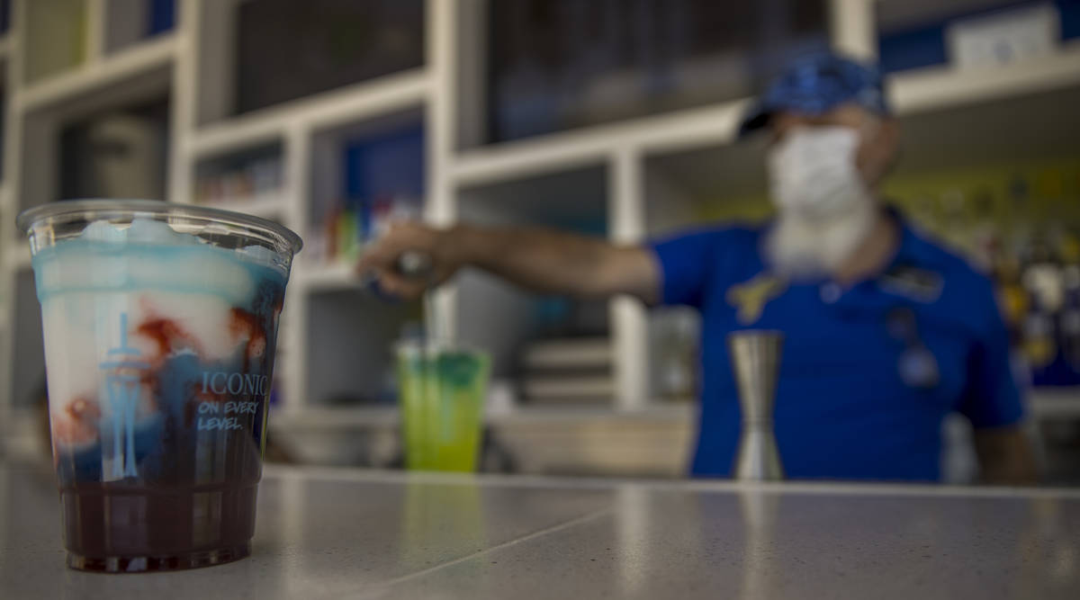 Bartender Rob Lopez makes another drink about the pool at The Strat on Saturday, June 6, 2020 i ...