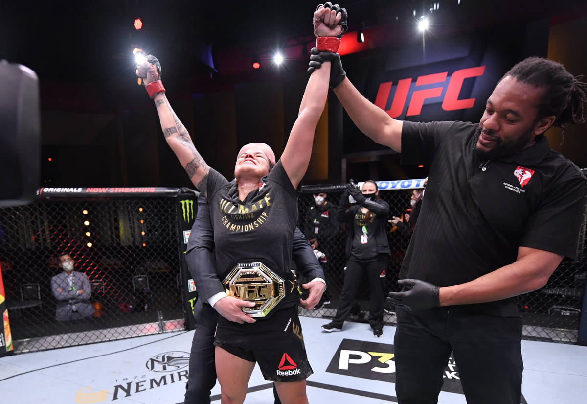 LAS VEGAS, NEVADA - JUNE 06: Amanda Nunes of Brazil celebrates after her unanimous-decision vic ...