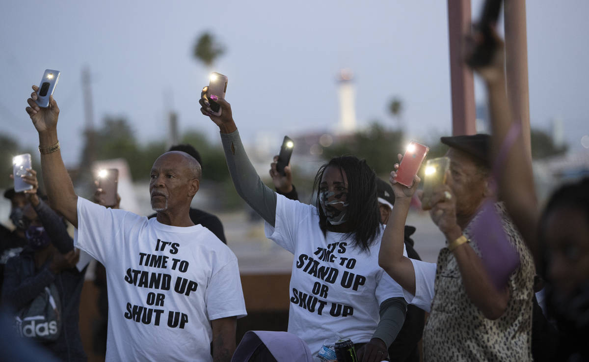 A moment of silence for George Floyd and all black lives lost to police brutality was held outs ...