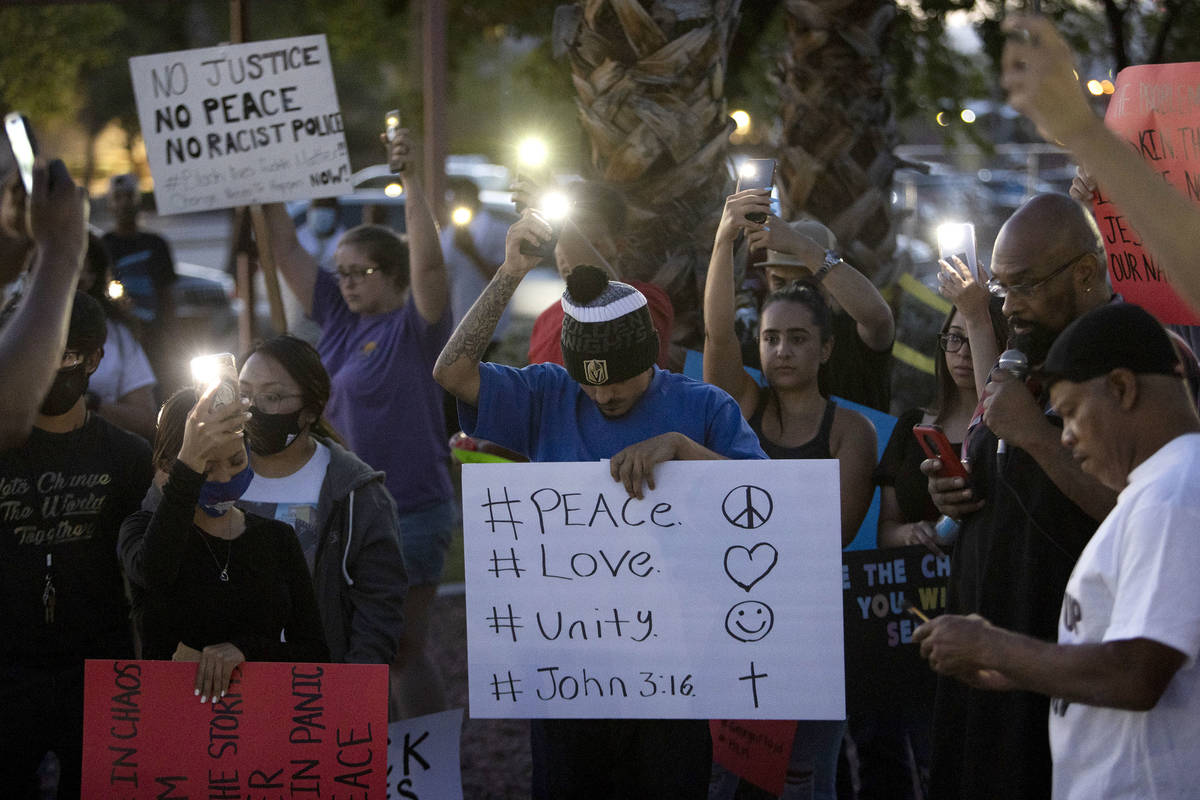A small group of people came together for a prayer night and a moment of silence outside the Ma ...