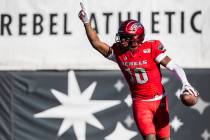 UNLV Rebels wide receiver Darren Woods Jr. (10) celebrates after scoring a touchdown in the fir ...