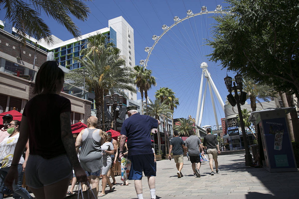 Tourists walk at The Line Promenade on Sunday, June 7, 2020, in Las Vegas.(Bizuayehu Tesfaye/La ...