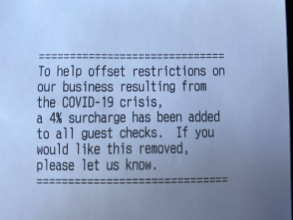 A notice of the COVID fee, and how to remove it, is printed on each check at El Segundo Sol, as ...