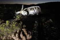 A white SUV appears to have rolled off U.S. 95 near Lee Canyon Road sometime before 5 a.m. Tues ...