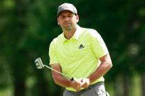 Sergio Garcia, of Spain, watches his putt on the ninth hole during the final round of the Wells ...