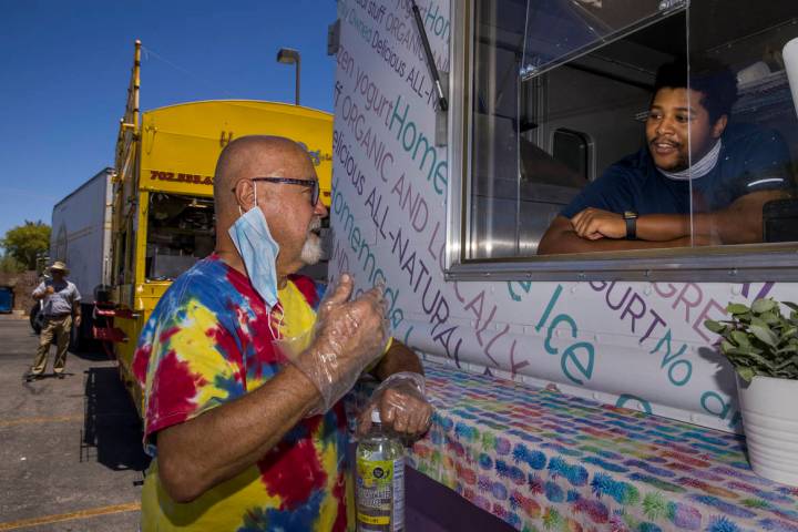 Gene Gunnels, left, of the Hot Diggity Dog Las Vegas and Jonathan Bradley of the Spoon-a-Bowl ...