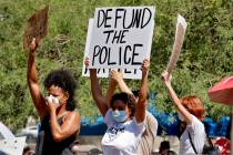 Protesters rally Wednesday, June 3, 2020, in Phoenix, demanding the Phoenix City Council defund ...