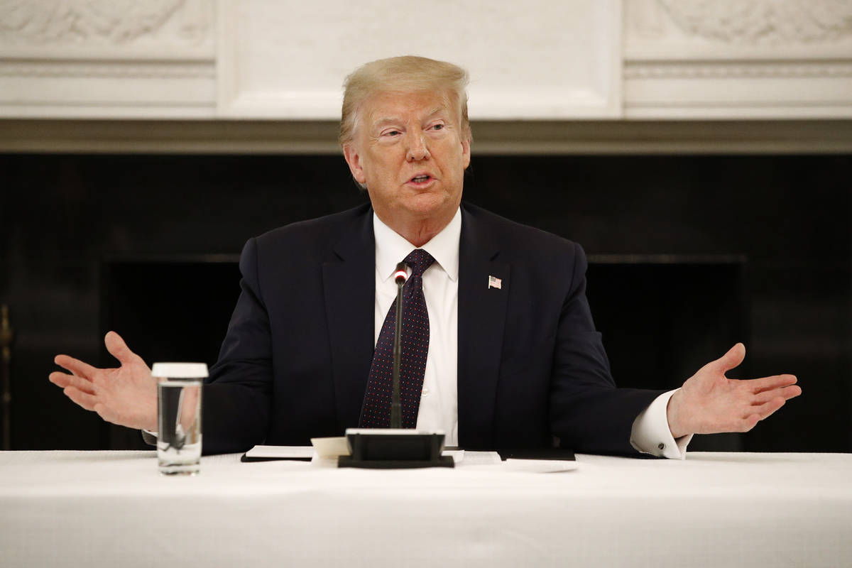 President Donald Trump speaks during a roundtable discussion with law enforcement officials, Mo ...