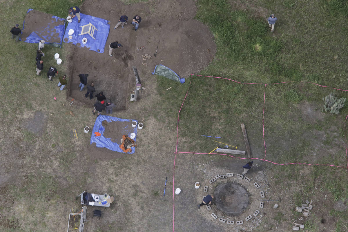 In this aerial photo, investigators search for human remains at Chad Daybell's residence in the ...