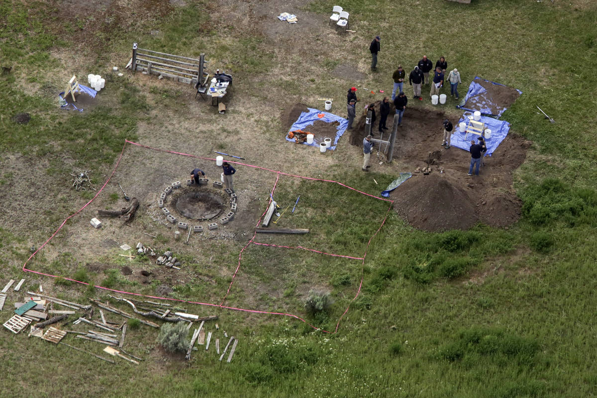 In this aerial photo, investigators search for human remains at Chad Daybell's residence in the ...
