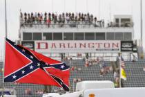FILE - In this Sept. 5, 2015, file photo, a Confederate flag flies in the infield before a NASC ...