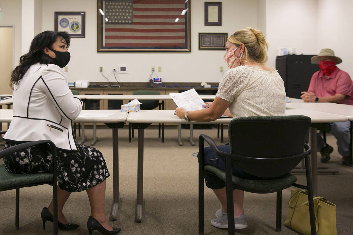 Stacey Campbell, left, chief deputy clerk at City of Las Vegas, and Molly Taylor, Recall Michel ...