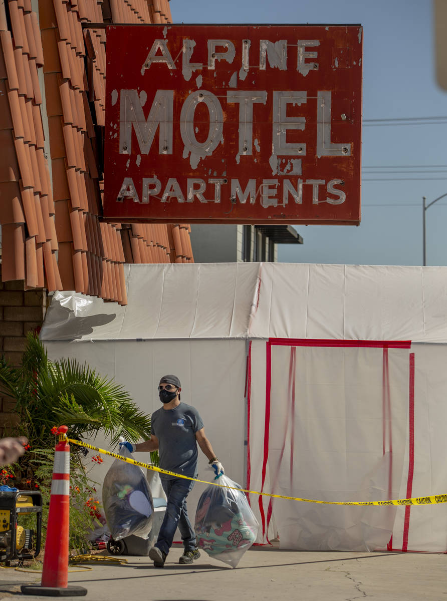 Javier from the Earth Resource Group Environmental Services carries out the possessions from fo ...