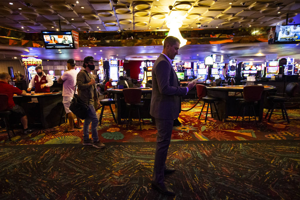 Jonathan Jossel, CEO of the Plaza, looks at a receipt showing a pizza slice purchased by a hote ...