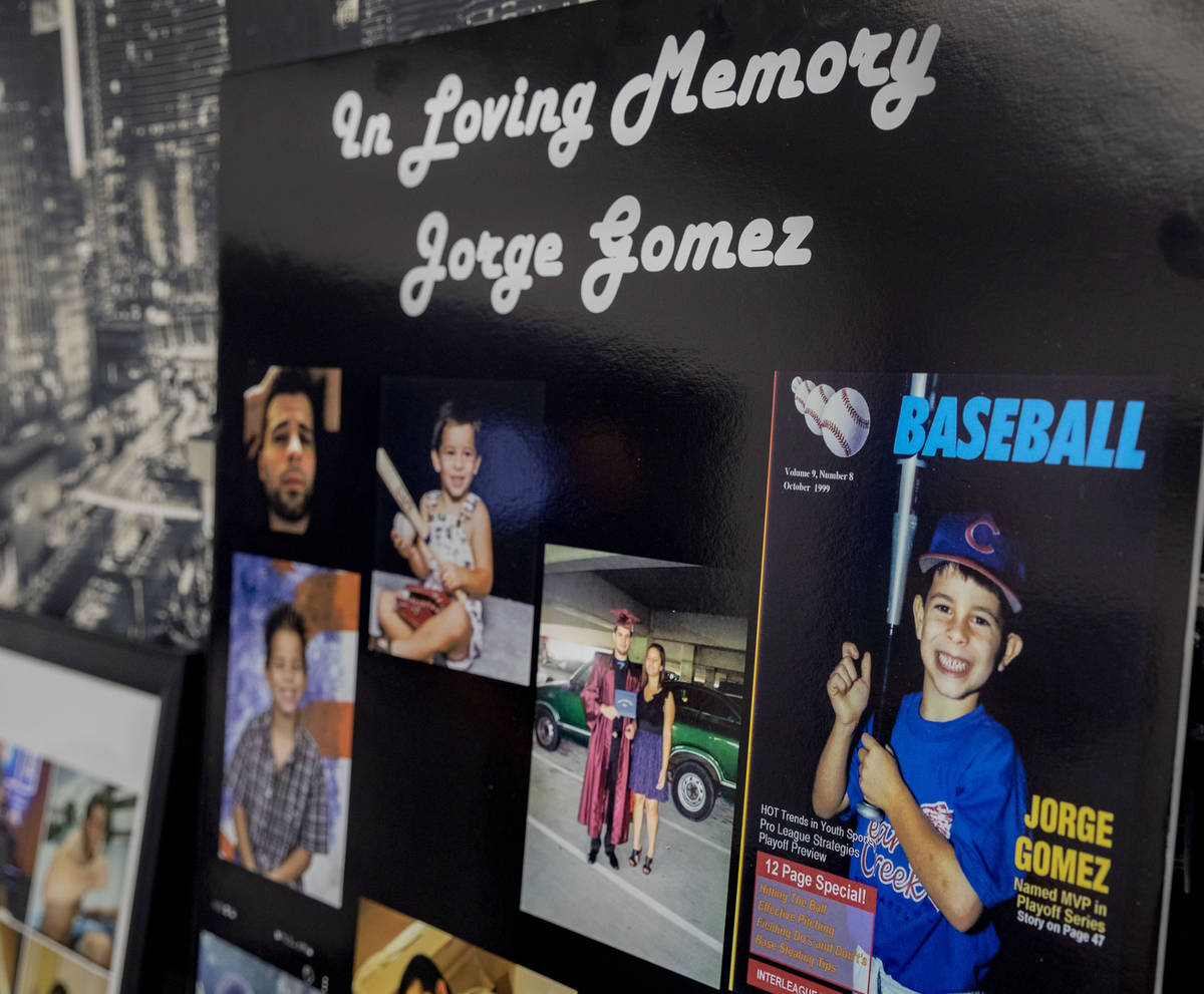 Photographs that were displayed at Jorge GomezÕs wake are seen during an interview with Go ...