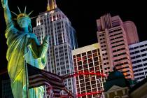 Lights through room windows are displayed at the New York-New York along the Las Vegas Strip on ...