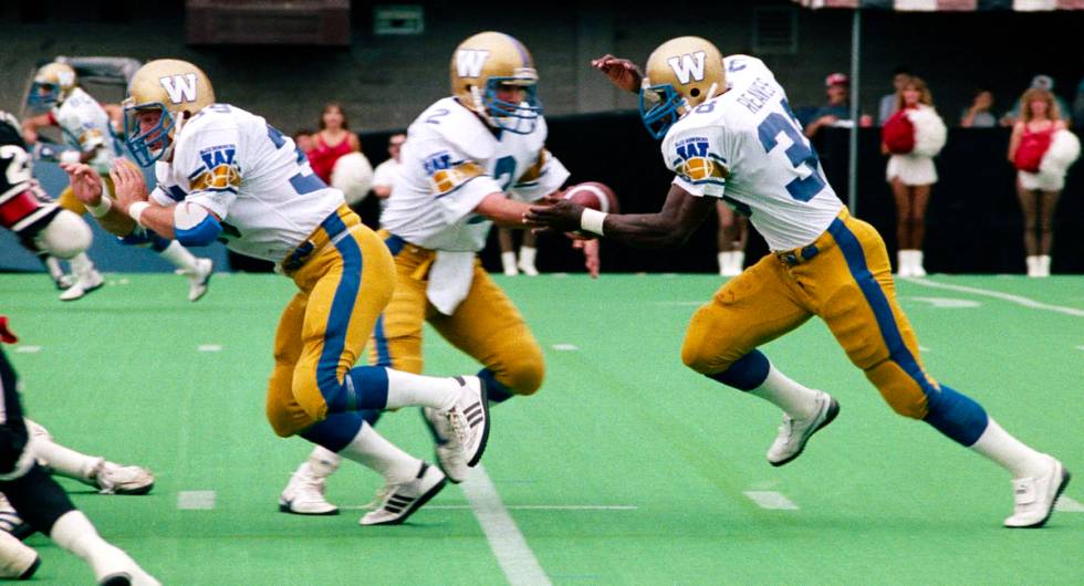 Willard Reeves, right, and Sean Kehoe, Winnipeg Blue Bombers, 1985. (John Bradley)