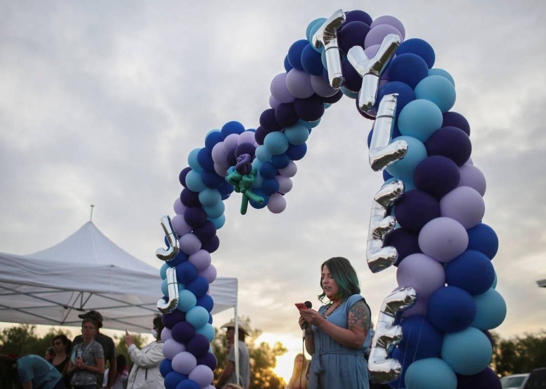 CORRECTS FIRST NAME OF SPEAKER TO TIMANEE INSTEAD OF TYLEE - Timanee Olsen speaks to visitors d ...