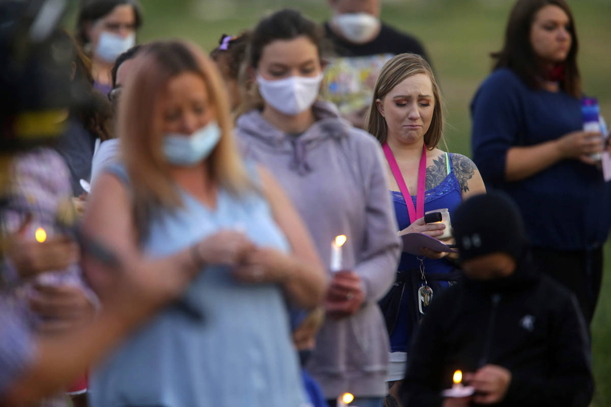 Visitors listen to "In the Arms of an Angel," during a memorial service for Tylee Rya ...