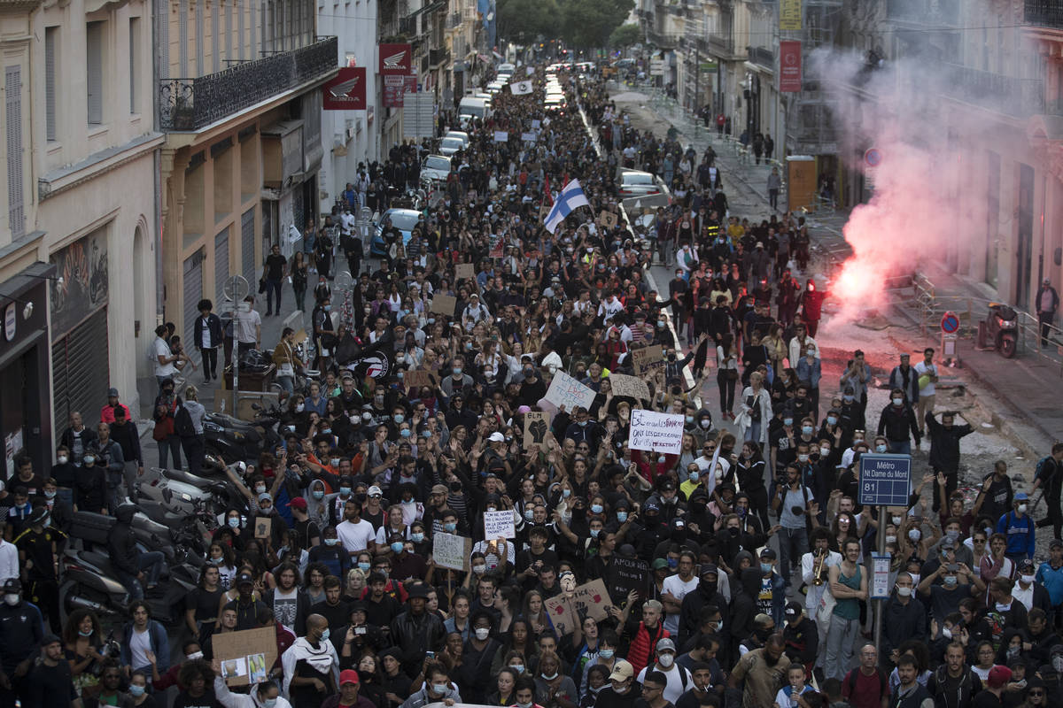 Protesters march against police brutality and racism in Marseille, France, Saturday, June 13, 2 ...