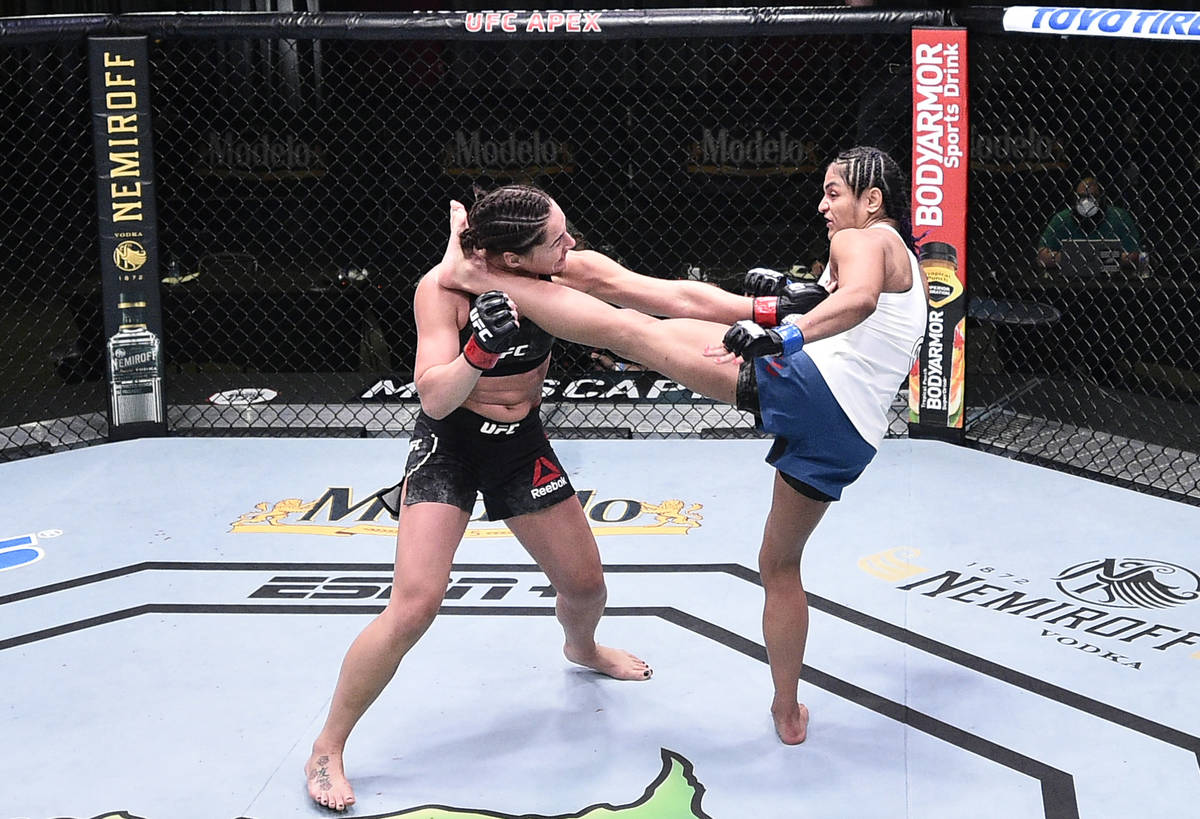 LAS VEGAS, NEVADA - JUNE 13: (R-L) Cynthia Calvillo kicks Jessica Eye in their flyweight fight ...