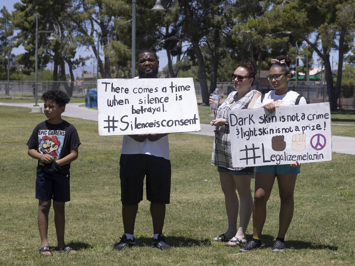 Rayfield Hearon Jr., 8, left, his father Rayfield Hearon Sr, second from left, his mother Disa ...