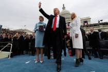 U.S. President Donald Trump acknowledges the audience after taking the oath of office as his wi ...