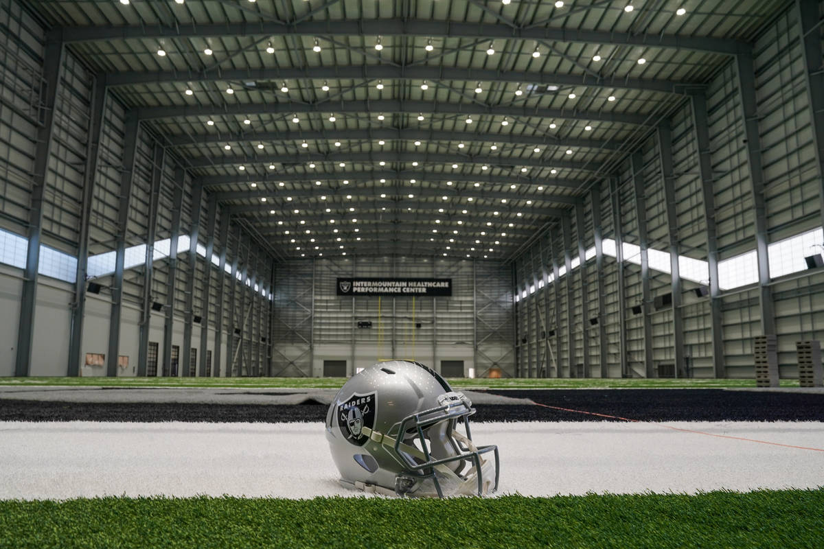 A Raiders helmet sits in one of the end zones in the field house of their Intermountain Healthc ...