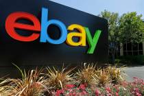 FILE - This Tuesday, July 16, 2013, file photo shows signage at eBay headquarters in San Jose, ...