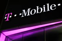 FILE--A sign for a T-Mobile store is displayed, Wednesday, Nov. 9, 2011, in New York. (AP Photo ...
