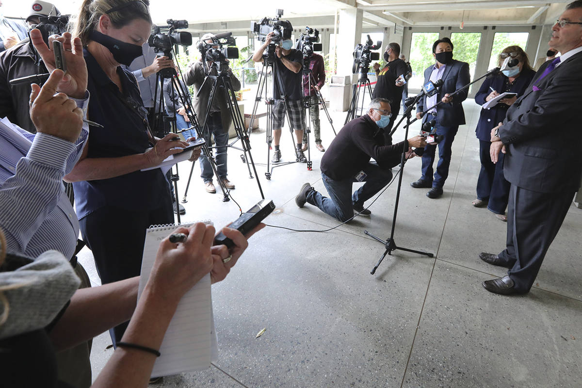 Steven Carrillo's attorney Jeffrey Stotter,right, speaks to the media outside the Santa Cruz Co ...