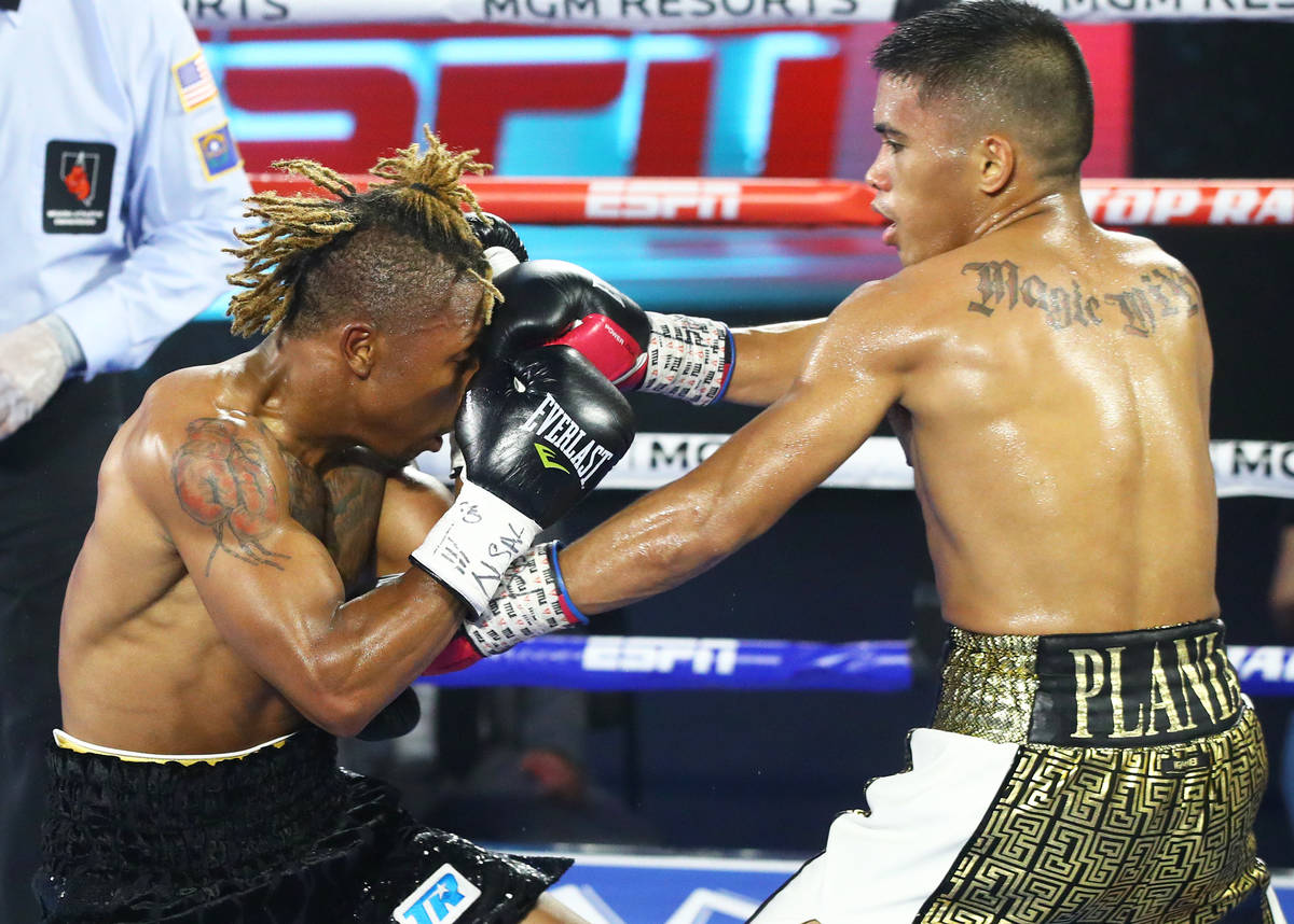 Joshua Greer Jr. (dark trunks) vs. Mike Plania inside the MGM Grand's Grand Ballroom on Tuesday ...