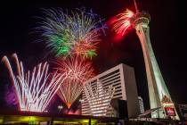 Fourth of July fireworks fill the Las Vegas skyline at the Elation rooftop pool on Wednesday, J ...