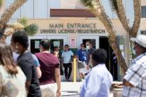 People wait in line at the Nevada Department of Motor Vehicles at 8250 W. Flamingo Road, which ...