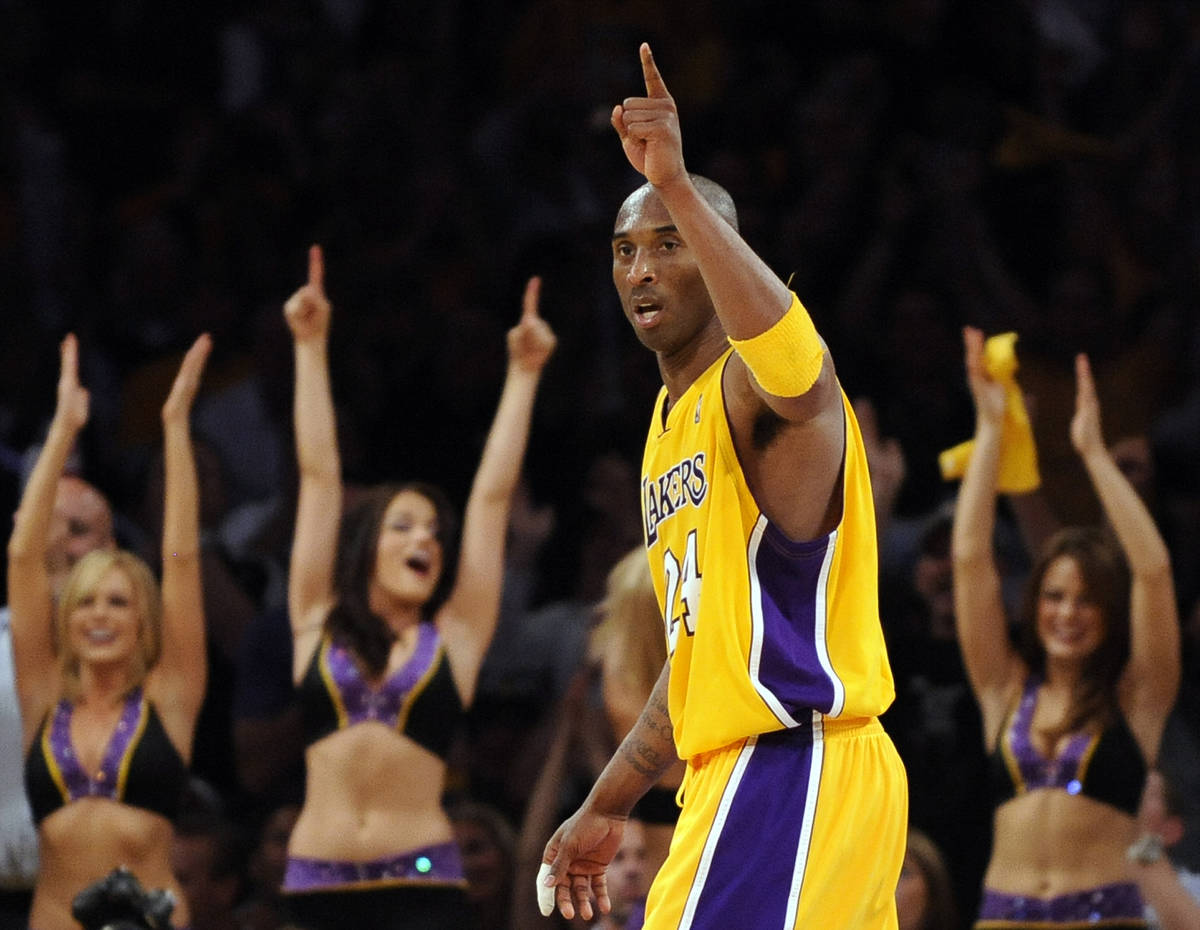 FILE - In this May 27, 2010, file photo, Los Angeles Lakers guard Kobe Bryant reacts after Pau ...