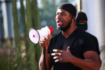 Vaughn Sanders speaks during a Black Lives Matter protest outside of Las Vegas City Hall on Wed ...
