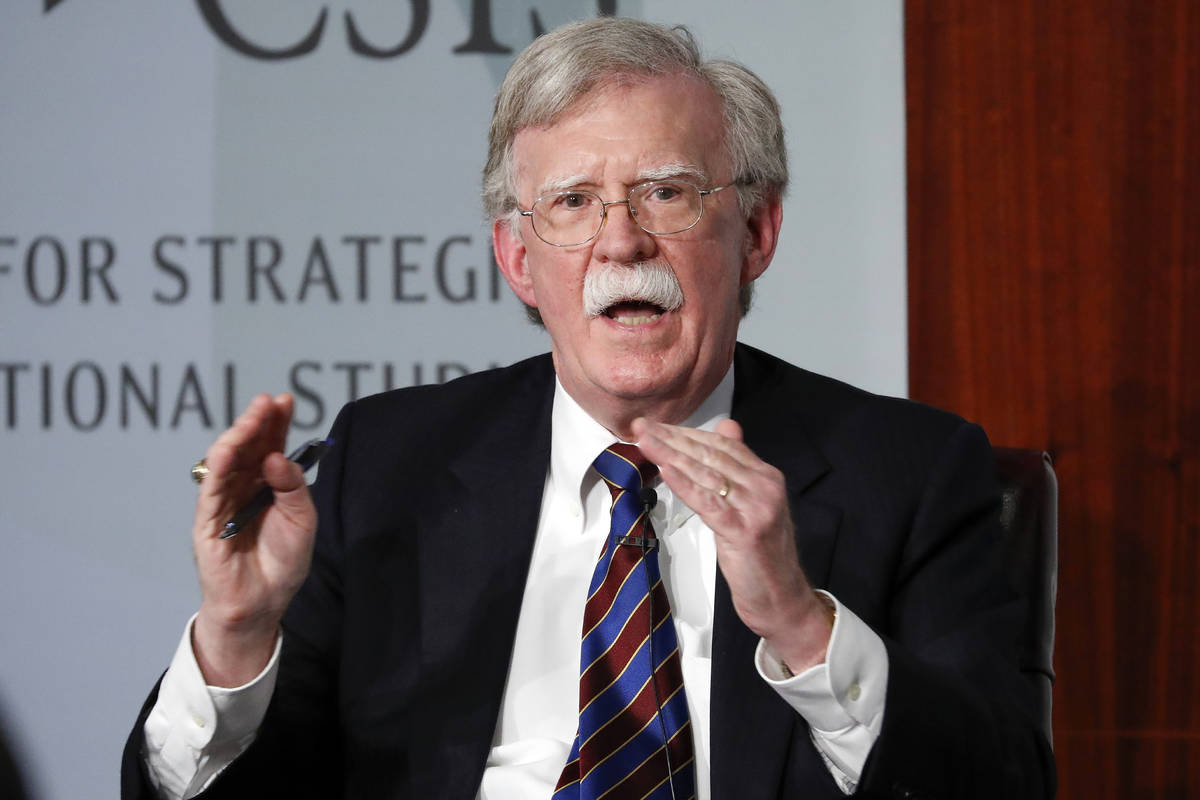 FILE - In this Sept. 30, 2019, file photo, former national security adviser John Bolton gesture ...